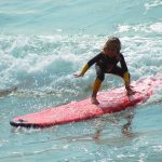 children-swimming-water-sea-surf