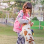 child with dog